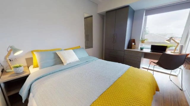 Bed desk wardrobe and chair student bedroom at iQ Collingwood in Newcastle Upon Tyne Student Accommodation