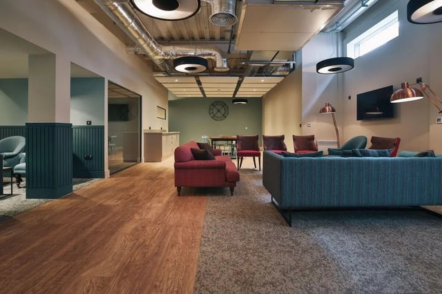 Sofas chairs and tables in a lounge living room at Picturehouse Apartments in Exeter Student Accommodation