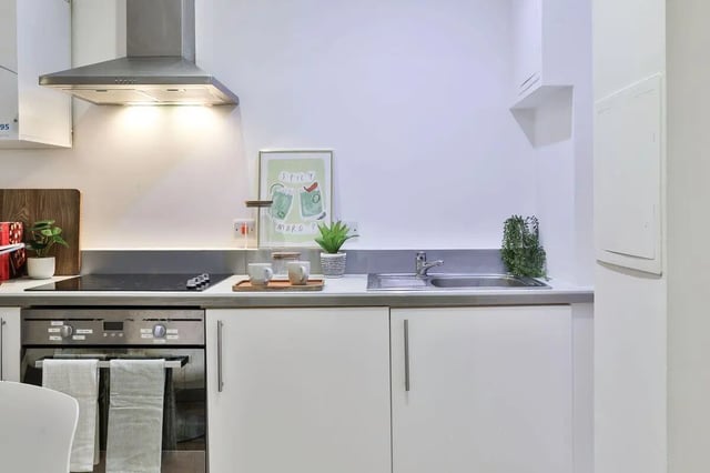 Modern kitchen with oven sink and cabinets kitchen at Picturehouse Apartments in Exeter Student Accommodation