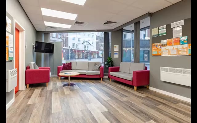 Sofas armchairs coffee table television common area at Medici in Nottingham Student Accommodation
