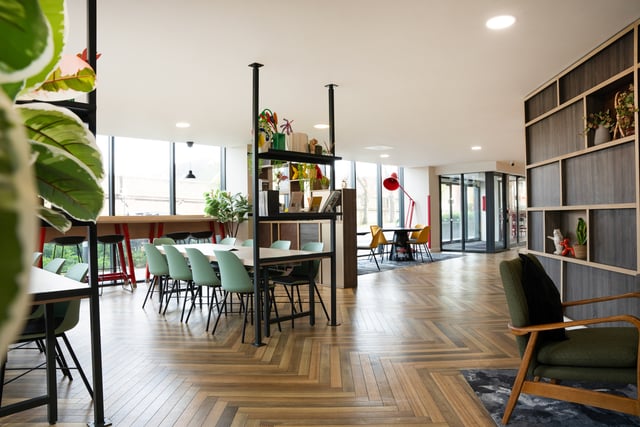 Desks chairs bar and plants common area at Vita Student Richmond House in Southampton Student Accommodation