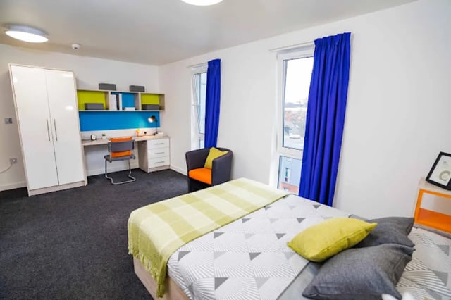 Bed wardrobe desk chair and chair bedroom at Queen's Park House in Coventry Student Accommodation
