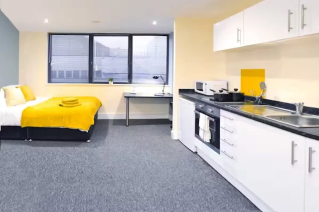 Bed desk kitchen with oven sink and microwave Studio at Hydrogen in Nottingham Student Accommodation