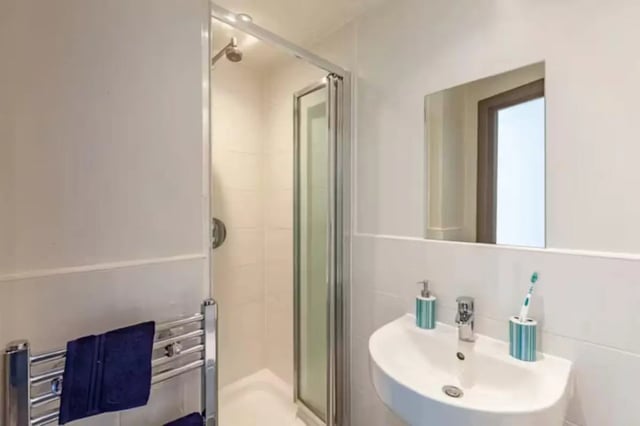 Shower sink mirror towels heated towel rail bathroom at Mercury House in Bournemouth Student Accommodation