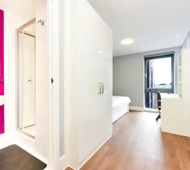 Wardrobe shower bed desk chair Bedroom at Tramways in Chester Student Accommodation