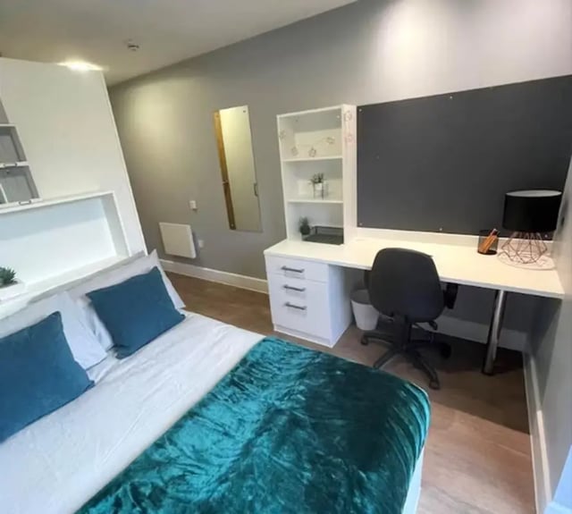 Bed desk shelves chair mirror bedroom at Tramways in Chester Student Accommodation