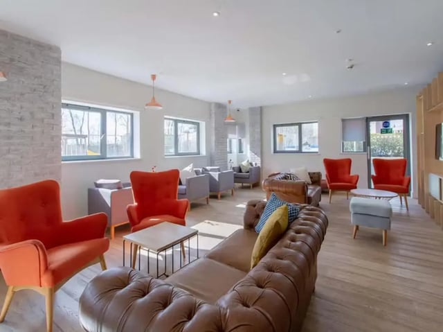 Sofa chairs tables and sofa living room at Collegelands in Glasgow Student Accommodation