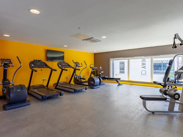 Gym equipment with treadmills and ellipticals playing area at West Way Square in Oxford Student Accommodation