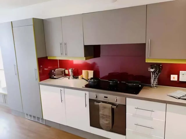 Modern student kitchen with oven stove pots and toaster kitchen at The Boulevard in York Student Accommodation