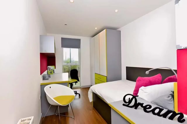 Bed desk wardrobe and chair student bedroom at The Boulevard in York Student Accommodation