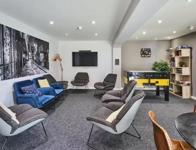 Chairs TV foosball table game room at The Boulevard in York Student Accommodation
