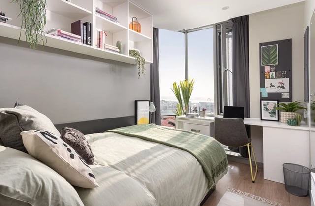 Bed desk and shelves student bedroom at Horizon Heights in Liverpool Student Accommodation