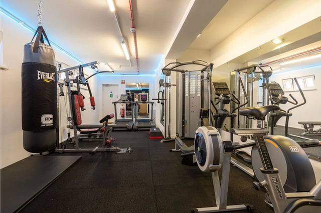 Punching bag treadmills and gym equipment gym at St Augustine's House in Plymouth Student Accommodation