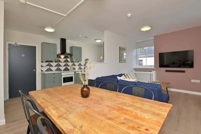 Dining table kitchen area and living room at Isca Lofts in Exeter Student Accommodation