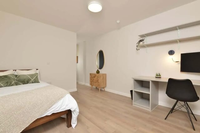 Bed desk chair mirror dresser bedroom study area at Isca Lofts in Exeter Student Accommodation