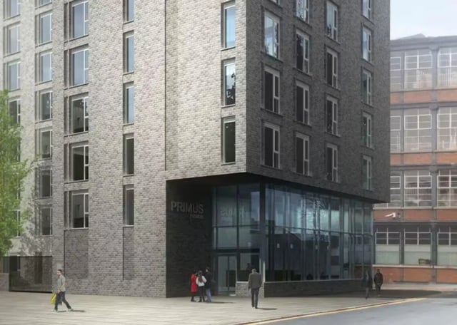 Modern brick building with large windows exterior at Edge Apartments in Birmingham Student Accommodation