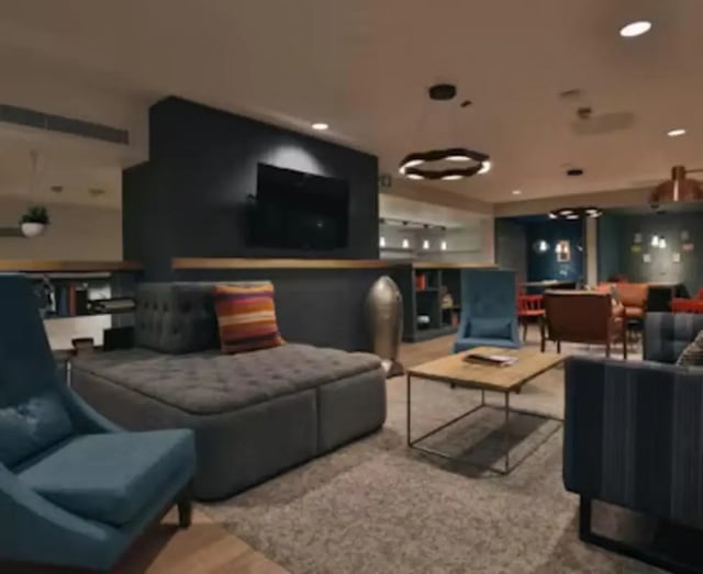 Modern lounge with plush seating and television Living room at College Green in Bristol Student Accommodation