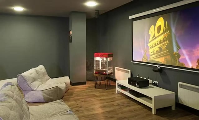 Beanbag seating popcorn machine projector movie screen cinema room at Claremont House in Glasgow Student Accommodation