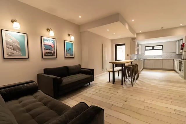 Sofas kitchen island dining table bar stools kitchen at 74 Woodcroft Road in Liverpool Student Accommodation