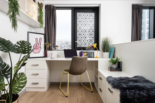Desk with laptop plants and chair Study area at Artisan Heights in Manchester Student Accommodation