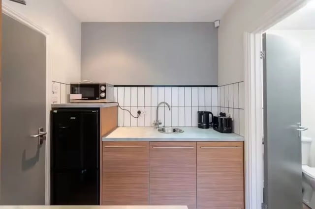 Microwave fridge sink kettle toaster cabinets kitchen at 29 Trewhitt Road in Newcastle Upon Tyne Student Accommodation