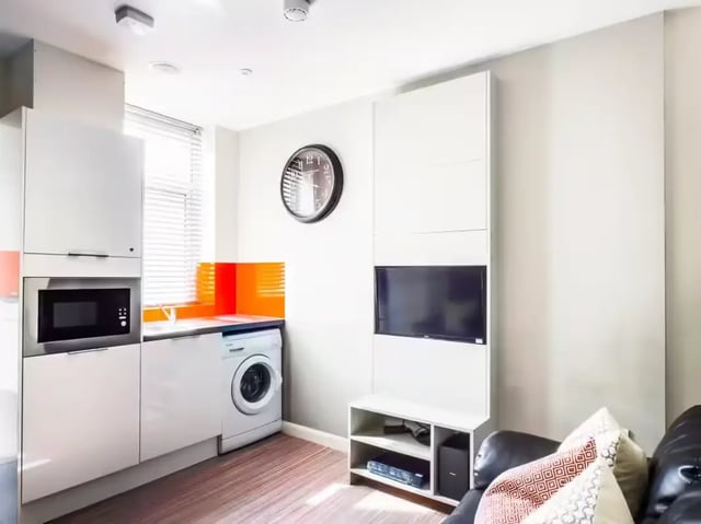 Microwave washing machine TV entertainment unit kitchen at 128 Ashford Street in Stoke-On-Trent Student Accommodation