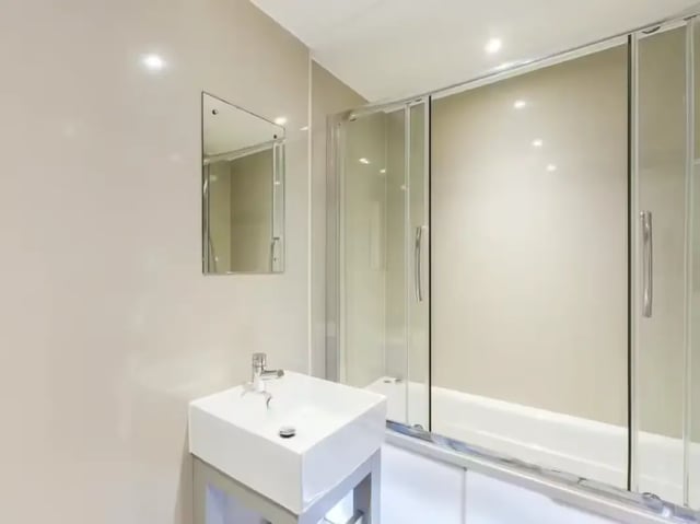 Sink mirror shower enclosure bathtub bathroom at 128 Ashford Street in Stoke-On-Trent Student Accommodation