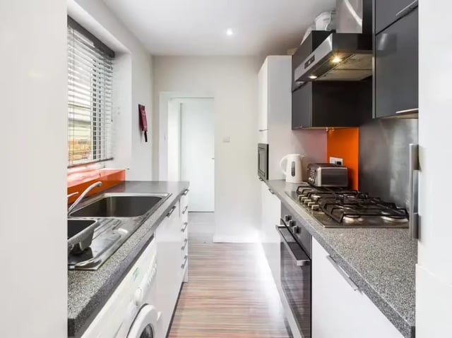 Sink washing machine hob toaster kettle kitchen at 219 Leek Road in Stoke-On-Trent Student Accommodation