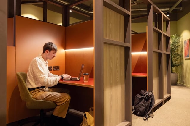 Student studies at desk with laptop study area at Bromley Place in Nottingham Student Accommodation
