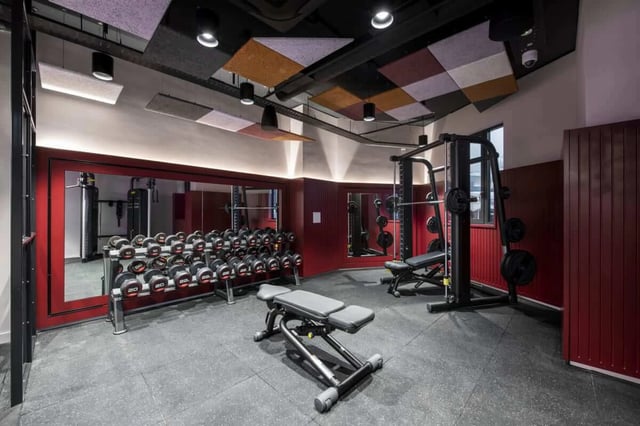 Dumbbells weight bench and squat rack gym at Hillside House Sheffield in Sheffield Student Accommodation