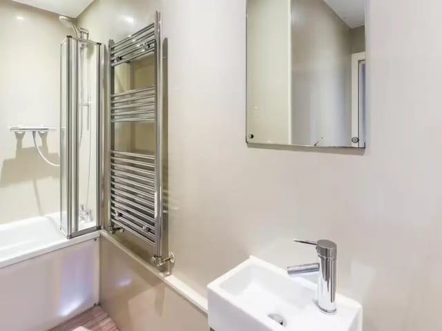 Shower bath towel rail sink mirror bathroom at 41 Guildford Street in Stoke-On-Trent Student Accommodation