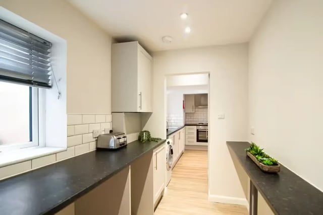 Kitchen cabinets toaster washing machine kitchen at 231 Leek Road in Stoke-On-Trent Student Accommodation