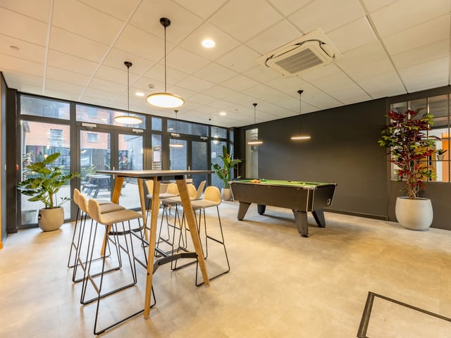 Pool table high table bar stools communal area at Straits Manor in Sheffield Student Accommodation