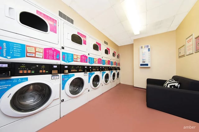 Washing machines dryers vending machine couch Laundry Room at Mercury Point in Southampton Student Accommodation