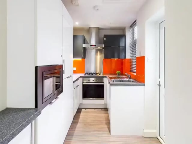 Modern kitchen with built-in oven microwave and sink kitchen at 6 Guildford Street in Stoke-On-Trent Student Accommodation