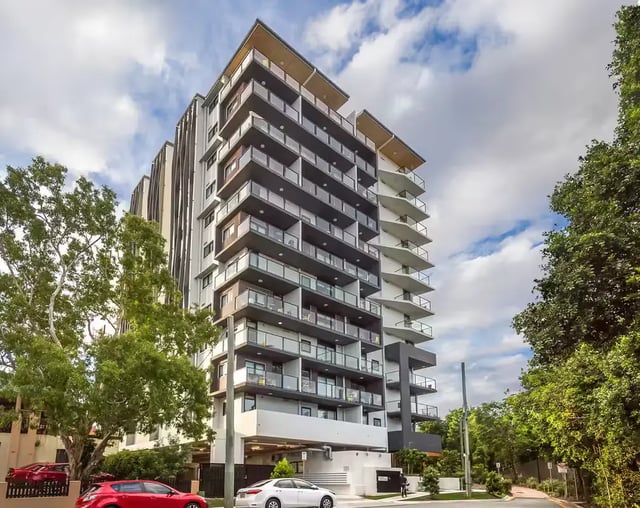 Modern apartment building with balconies exterior at Scape Regent in Brisbane Student Accommodation
