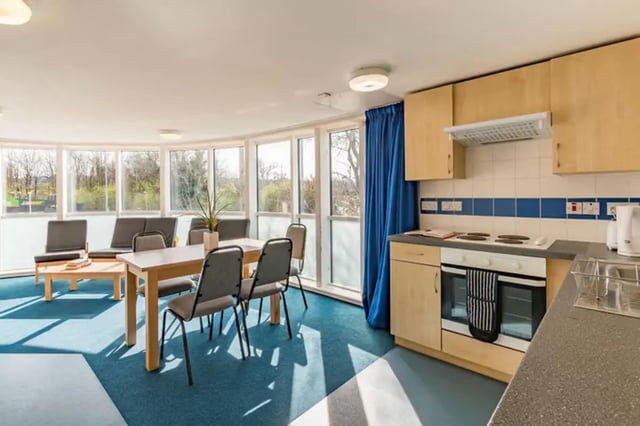Dining table chairs sofa kitchen with oven living area at The Cube - Loughborough in Loughborough Student Accommodation