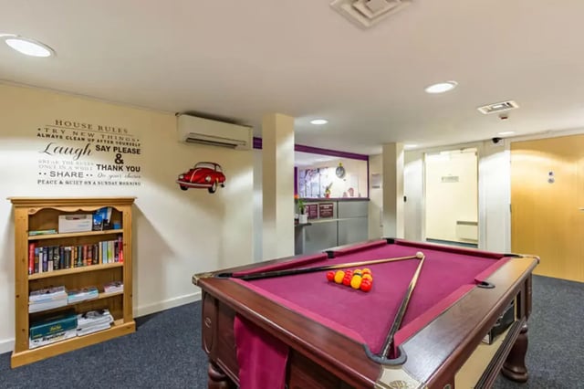 Pool table with balls and cues recreation room at The Cube - Loughborough in Loughborough Student Accommodation