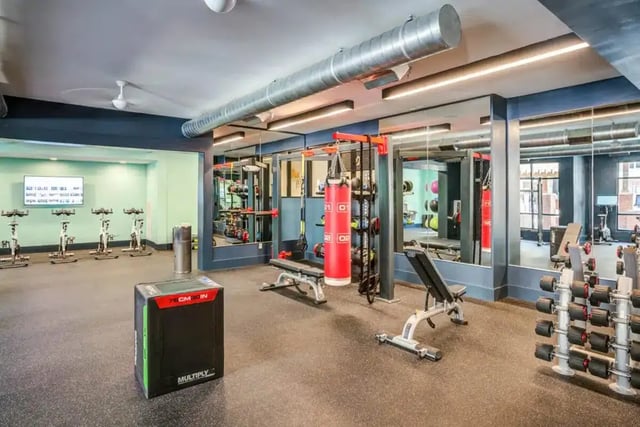 Gym equipment including spin bikes and weights gym. at Signature 1505 (Theory) in Raleigh Student Accommodation
