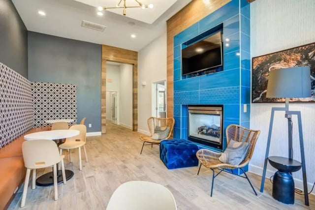 Seating area with fireplace TV living room at The Mill at Auburn in Auburn Student Accommodation