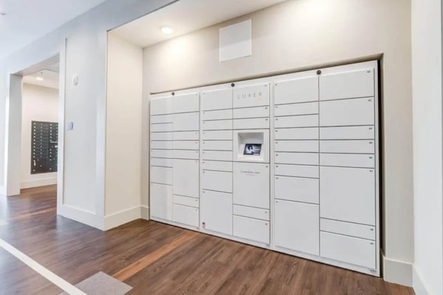 LUXER package lockers with touchscreen Parcel lockers area at The Nest At University Center in Rock Hill Student Accommodation