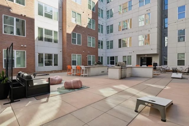 Outdoor seating grills and seating area exterior at Nova Knoxville in Knoxville Student Accommodation