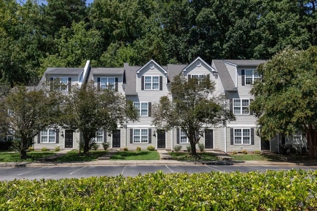 Townhouses with black doors and windows exterior at Red Wolf Crossing in Raleigh Student Accommodation