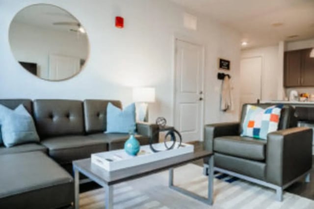 Modern living room with sectional sofa and coffee table living room at Vista Starkville in Starkville Student Accommodation