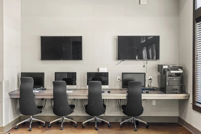 Computers printers and TVs study area at University Village at 2505 in Raleigh Student Accommodation