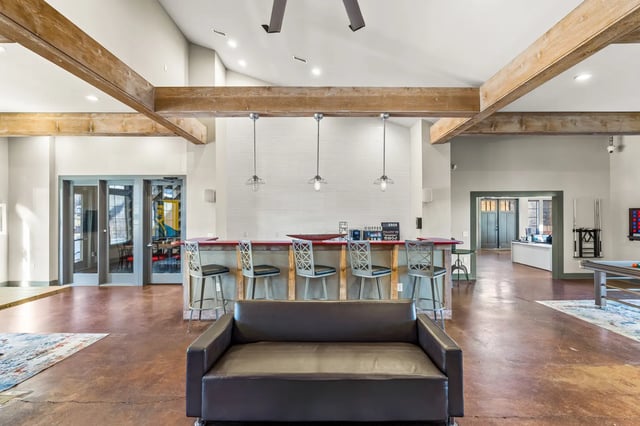 Sofa bar stools and coffee station communal area at University Village at 2505 in Raleigh Student Accommodation