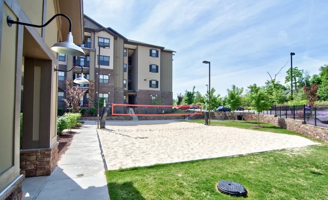 Volleyball court with sand and net exterior at University Village at 2505 in Raleigh Student Accommodation