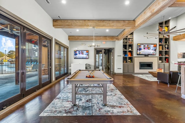 Pool table with balls and cues lounge area at University Village at 2505 in Raleigh Student Accommodation
