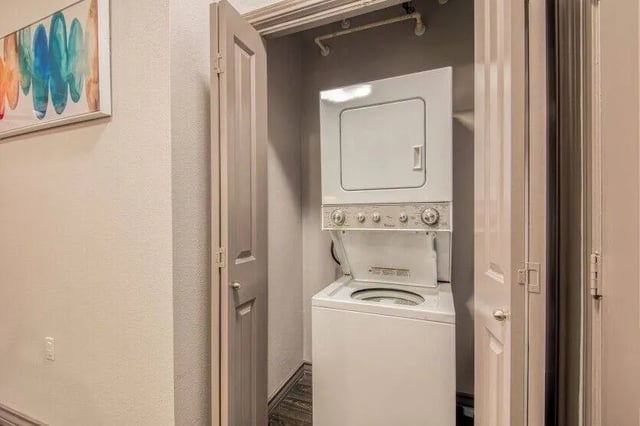 Stackable washer and dryer unit laundry area at Cherry Street in College Station Student Accommodation