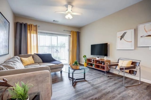 Sofa coffee table TV stand artwork living room at Madera in San Antonio Student Accommodation